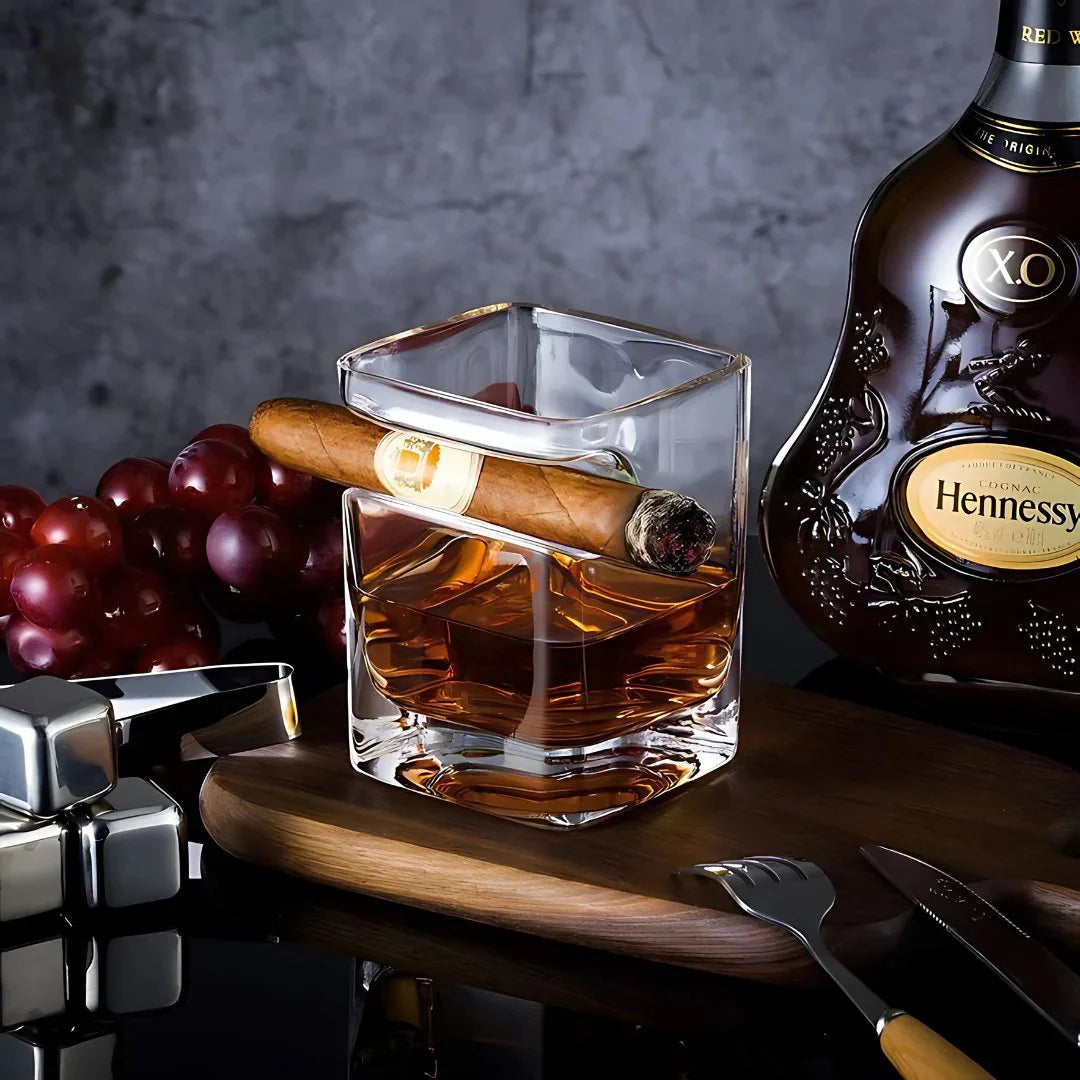 The Cigar Holding Whiskey Glass The Cigar Holding Whiskey Glass