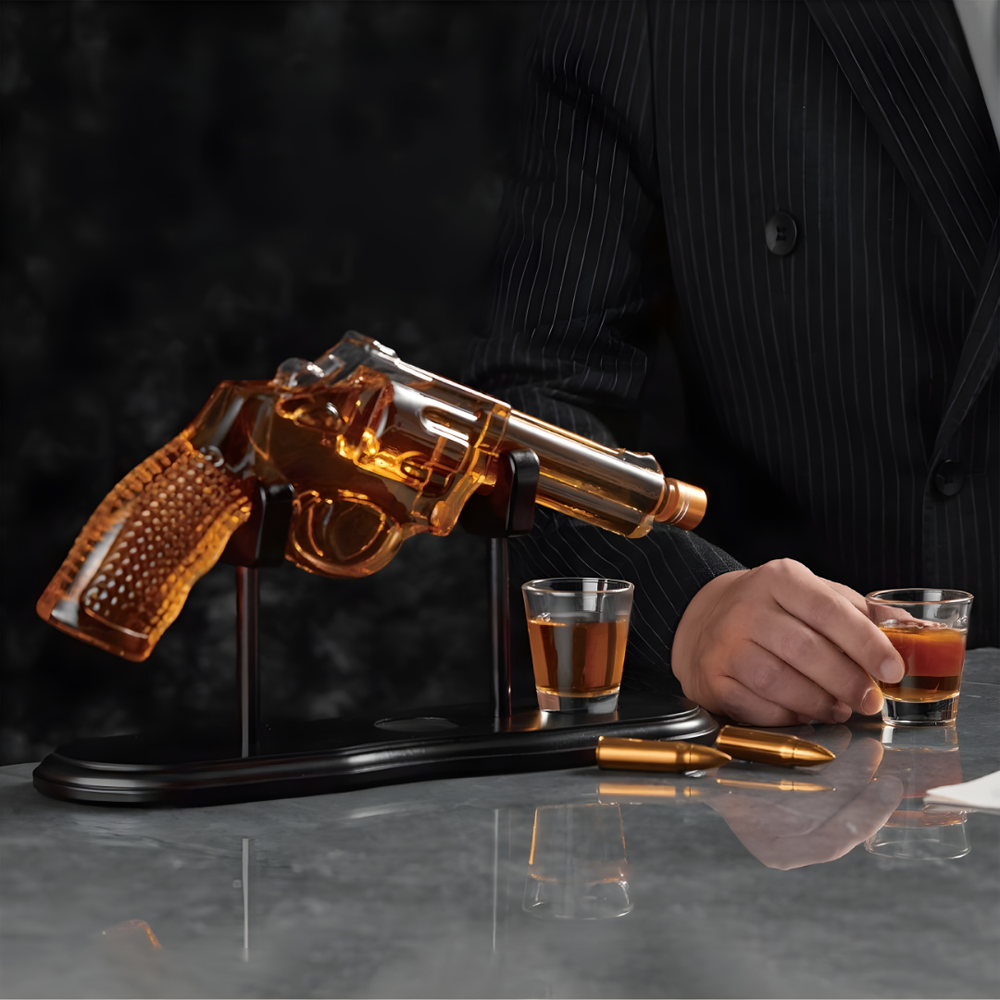 Pistol Whiskey Decanter Set showcasing a crystal decanter and glasses, perfect for bold whiskey pours.