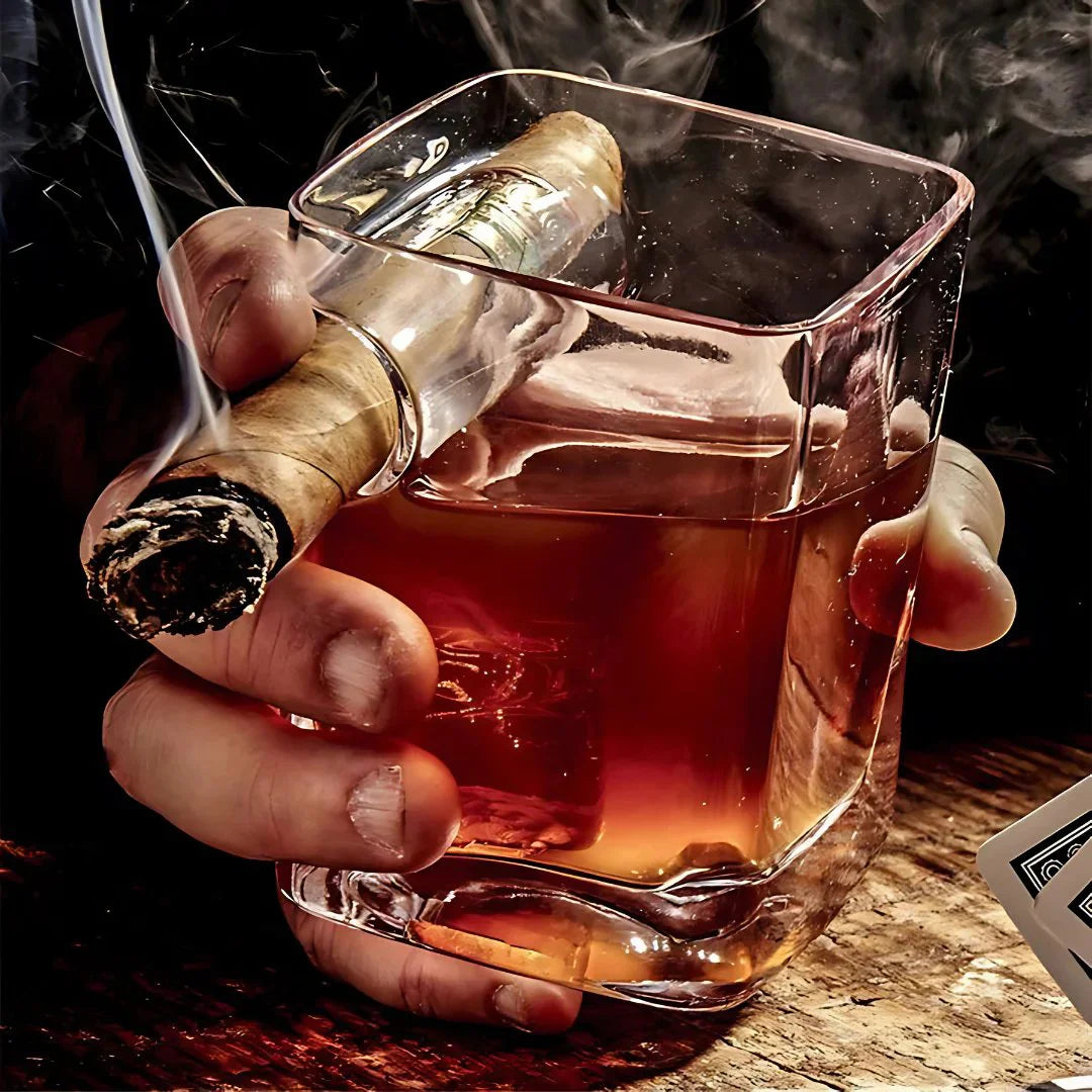 The Cigar Holding Whiskey Glass The Cigar Holding Whiskey Glass