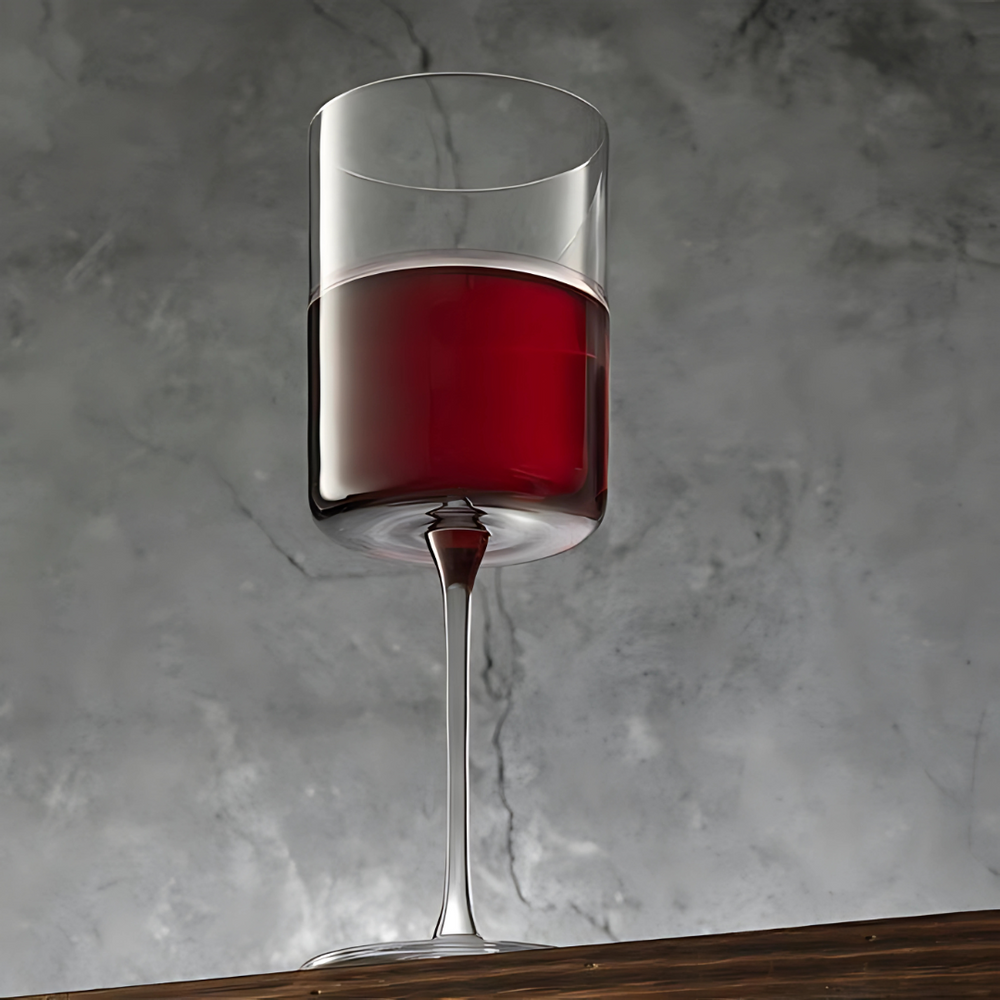 Monarch Stem Wine Glass — Pack of 6 showcasing red wine in a tall, elegant design against a textured backdrop.