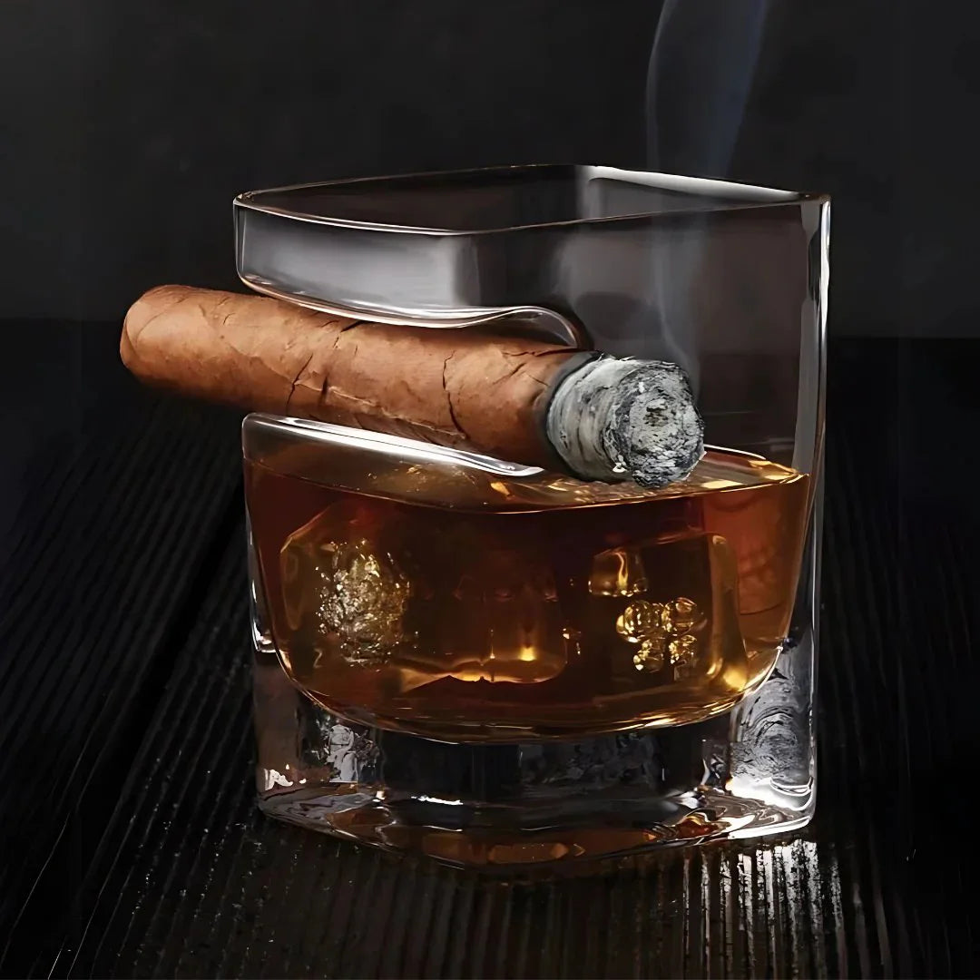 The Cigar Holding Whiskey Glass