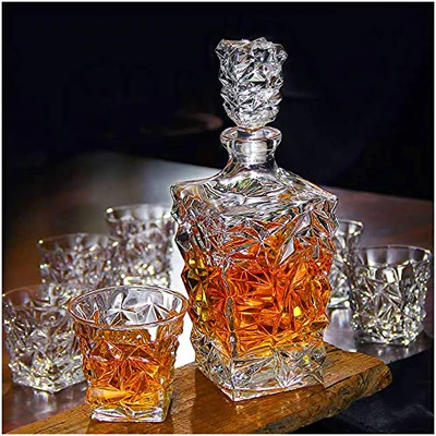 Textured crystal whiskey decanter with stopper and six matching whiskey glasses on wood tray