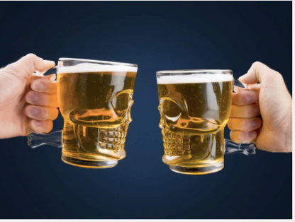 Skull Beer Mug with a detailed skull face and glass handle.